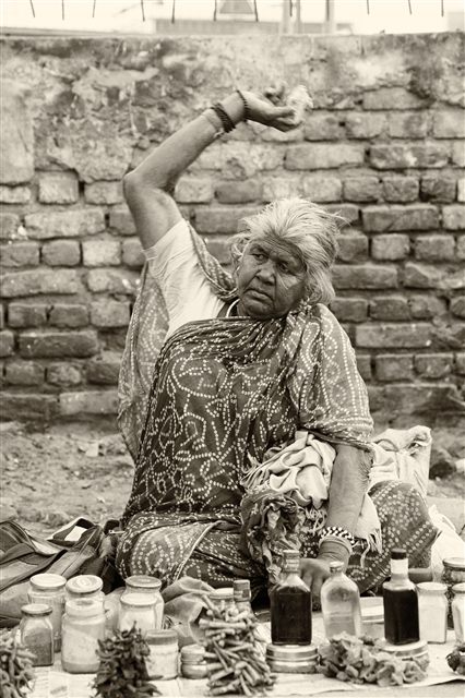 woman throwing stone