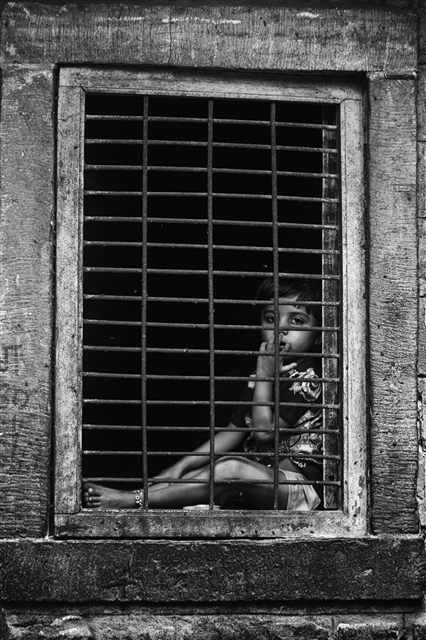 Caged girl